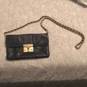 Tory Burch Black and Gold Clutch